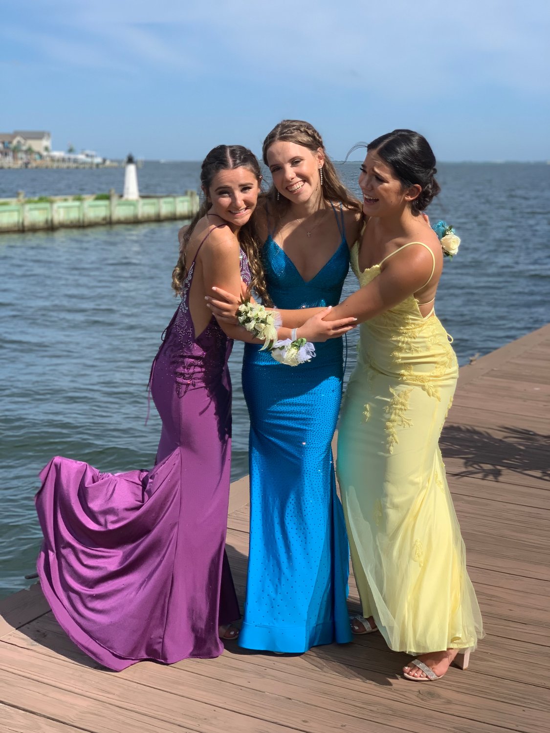 Alyssa Donnelly, Brynn Scharf, and Nina Westerlind pose for the camera.